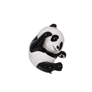 Panda Cub, Laying